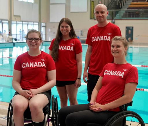 Paralympic swimmers and coach - From left to right: Shelby Newkirk, Hannah Ouellette, Ryan Jones (coach) and Nikita Ens.